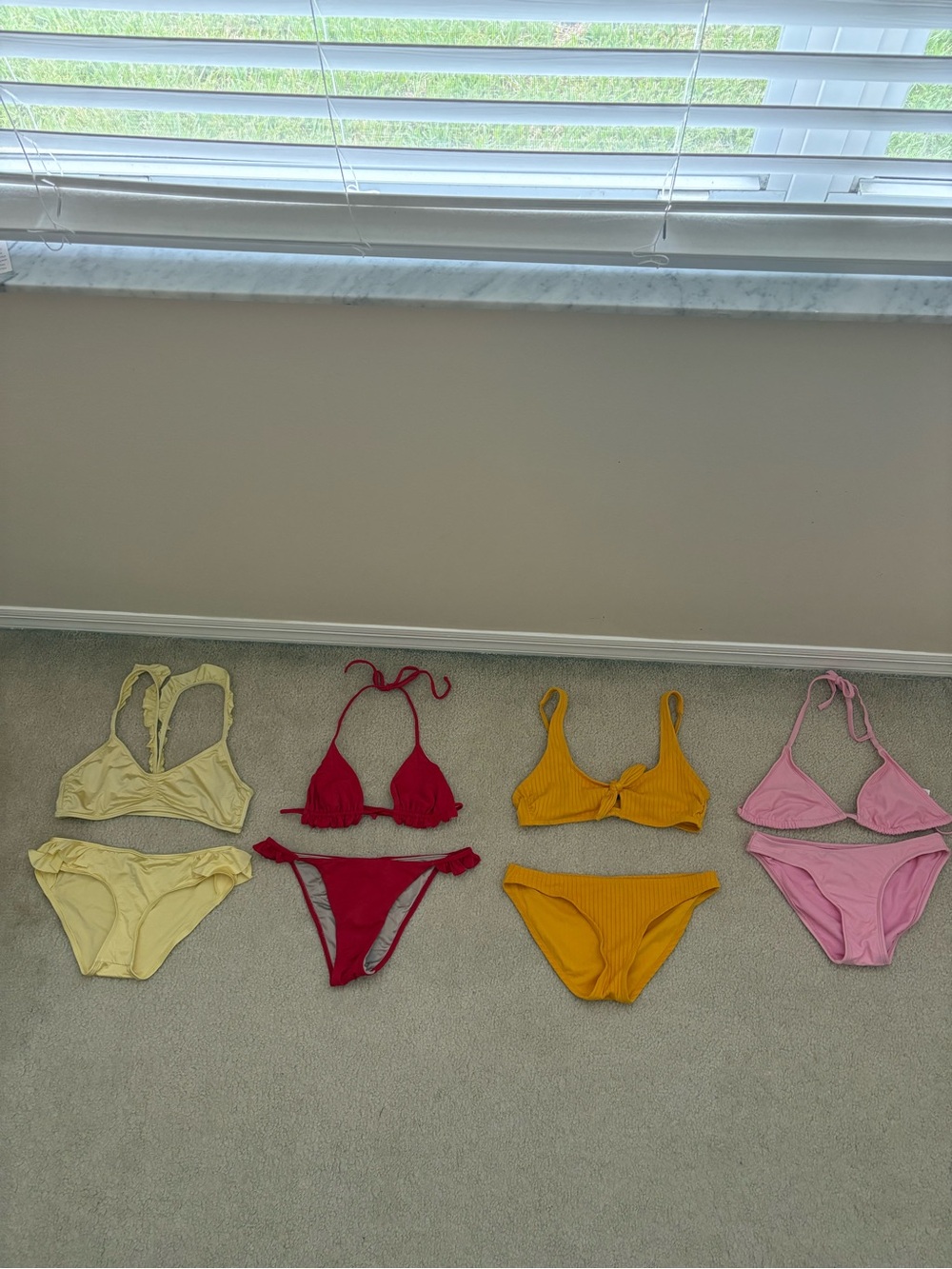 A Collection of Four Bikins
